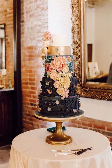 Incredible five-tiered wedding cake by artist Julie Deffense