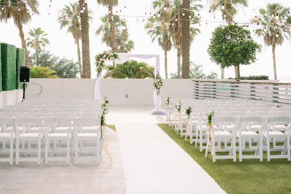 wedding ceremony on the pool lawn of the Wyndham Grand Clearwater Beach