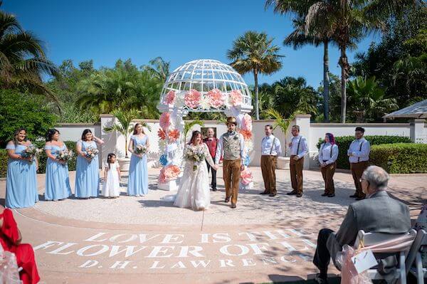 Just Married newlyweds head off after their wedding ceremony at the Florida Botanical Gardens