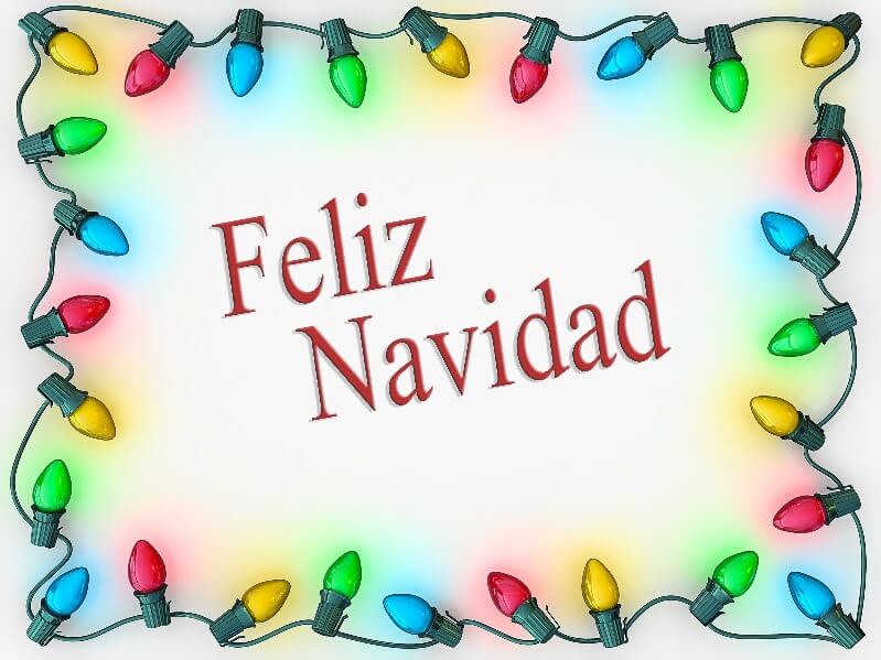 Feliz Navidad sign surrounded by Christmas lights