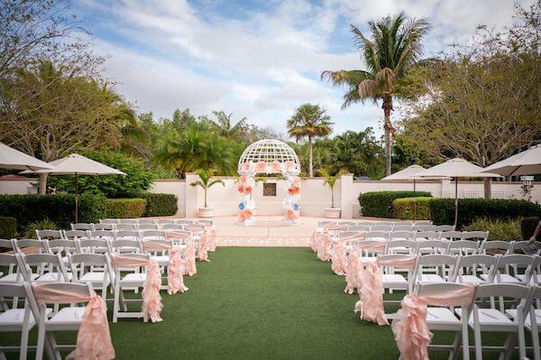 Wonderland themed wedding ceremony at the Florida Botanical Gardens