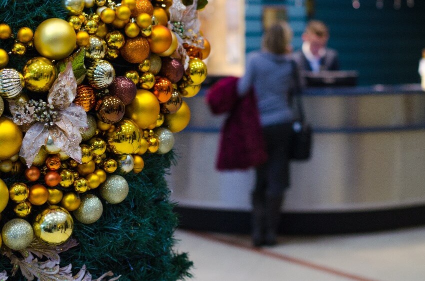 hotel lobby with silver and gold Christmas decorations