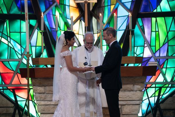 Bride and groom exchanging wedding vows