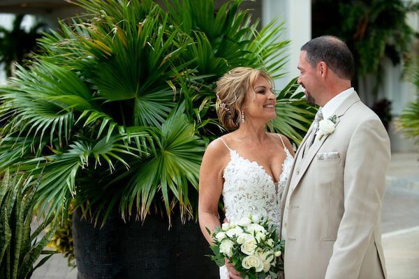 Bride and groom before their Sandpearl Resort wedding ceremony