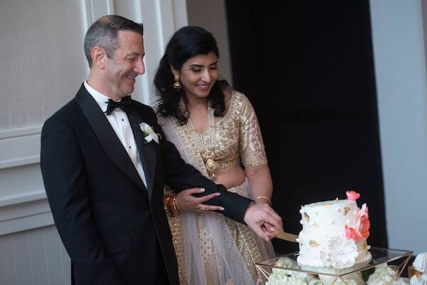 Tampa bride and groom cutting their wedding cake