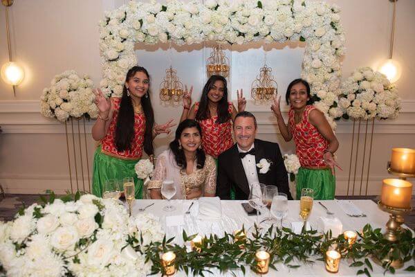 Indian dancers with the bride and groom at a Tampa Bay wedding reception