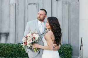 Bride and groom mat the Opal Sands Resort on Clearwater Beach