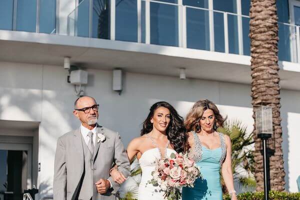 Bride's entrance to Pachelbel's Canon in D escorted by her parents