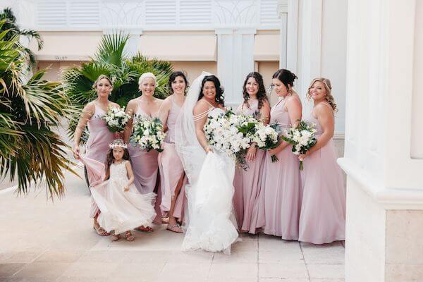 Bride with the bridal party at the Sandpearl Resort