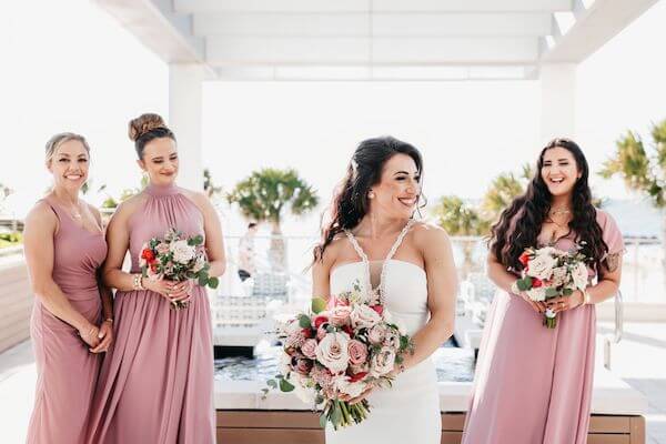 Bride and her bridesmaids on Clearwater Beach