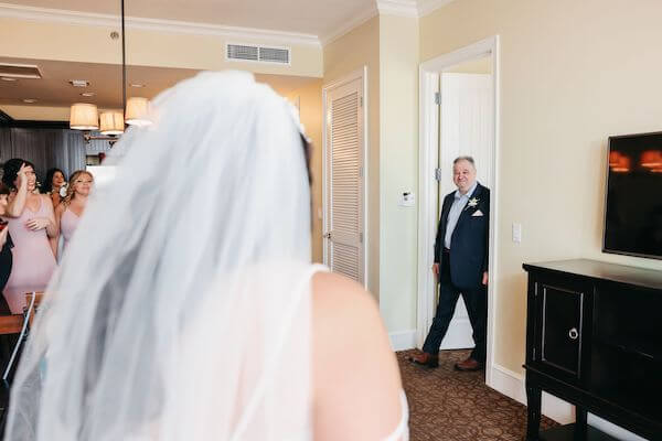 bride's first look with her father at the Sandpearl Resort