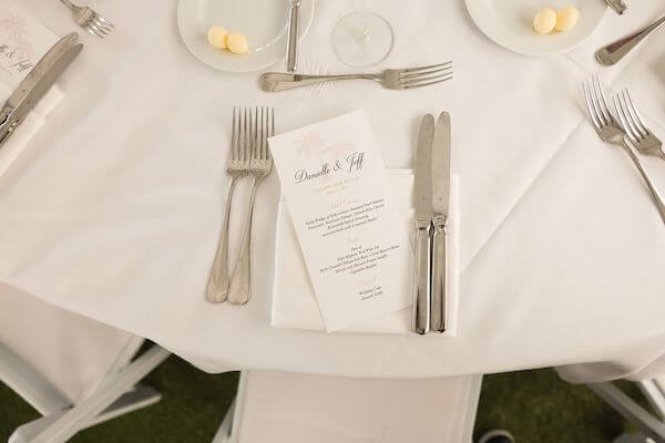 Custom menu cards for a tented Clearwater Beach wedding reception