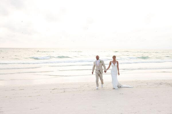 Sunset wedding photos along the Gulf of Mexico on Clearwater b<each