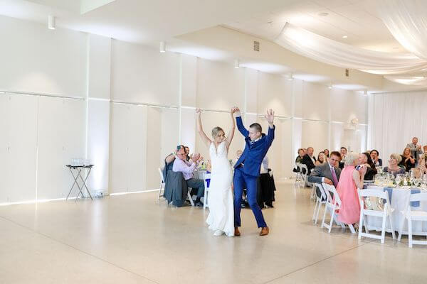 Newlyweds make a grand entrance at their Tampa Garden Club wedding reception 