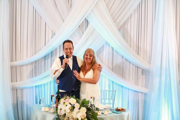 Bride and groom making a welcome speech