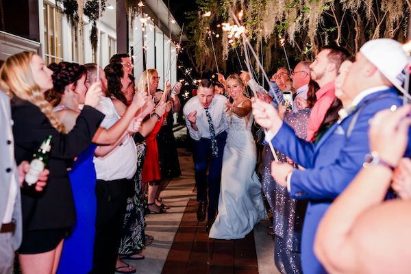 A grand sparkler exit outside of the Tampa Garden Club