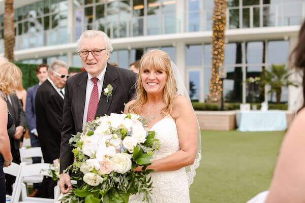 Bride walking down the aisle with her father