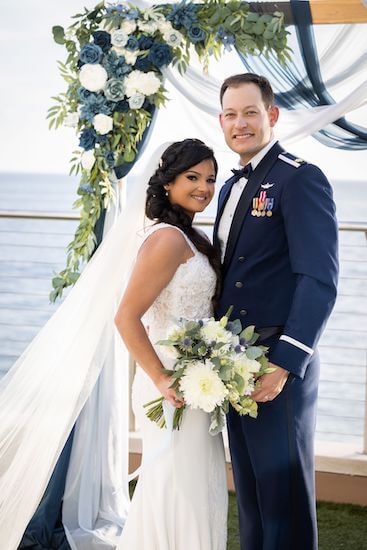 Bride and groom on the Event Lawn at the Opal Sands Resort