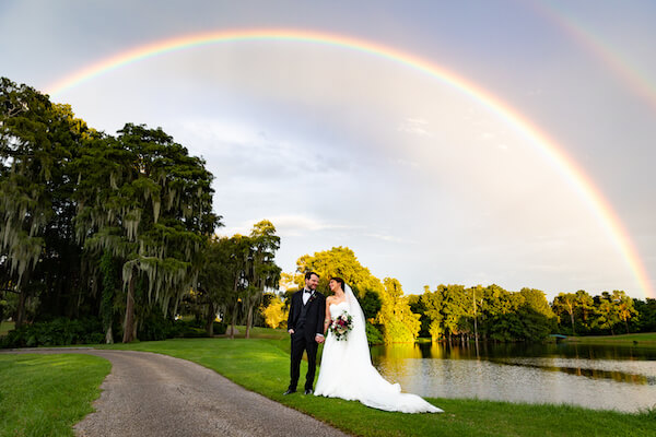 Palm Harbor bride and groom under a rainbow