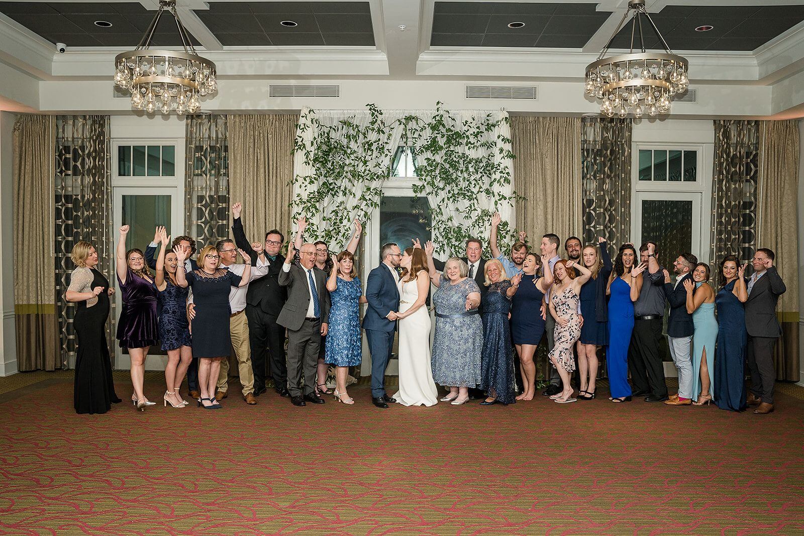 Photo of newlywed couple and their guests at an intimate wedding at The Birchwood in downtown St Pete