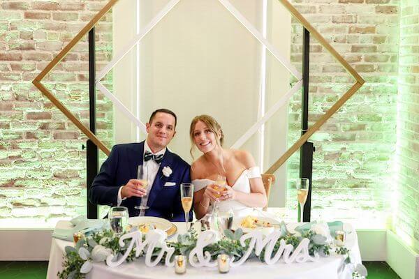 Bride and groom at their St. Pete Brunch wedding reception