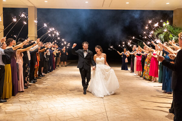 Newlyweds enjoy a sparkler sendoff after their Palm Harbor wedding reception