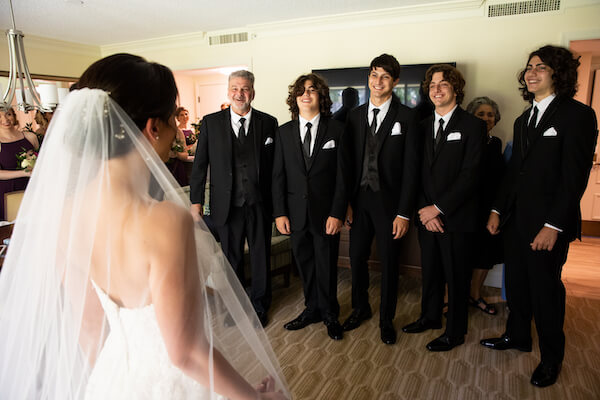 Palm Harbor bride having a first look with her father and brothers