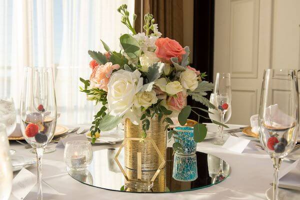 pink, white, and gold table scapes at a Sandpearl resort wedding reseption