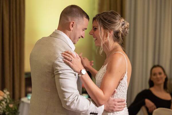 Bride and groom's first dance during their Sandpearl Resort wedding reception