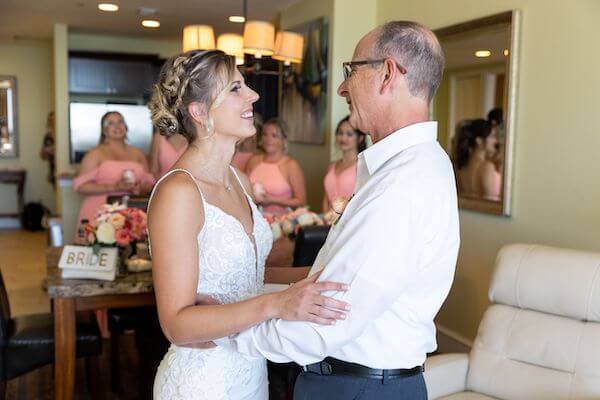 Bride's first look with her father before her clearwater beach wedding