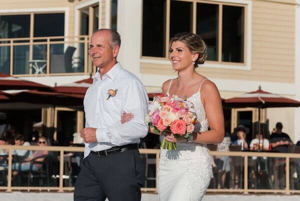 Bride and her father walking down the aisle on Clearwater Beach