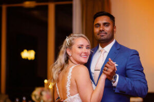 Bride and groom's first dance at their Sandpearl Resort wedding