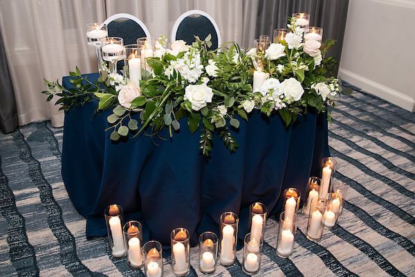 Luxurious blue and white sweetheart table 