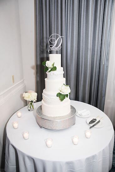 A five-tiered nautical knot wedding cake for a St. Pete Beach wedding.