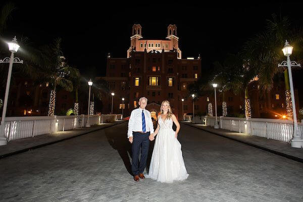 Bride and groom outside of the Don Cesar Hotel on St. Pete Beach.