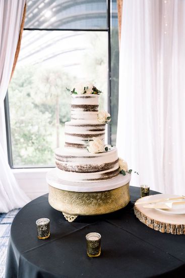 Semi-naked three-tiered wedding cake