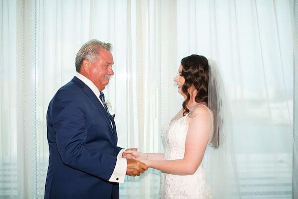 Opal Sands bride having a private moment with her father