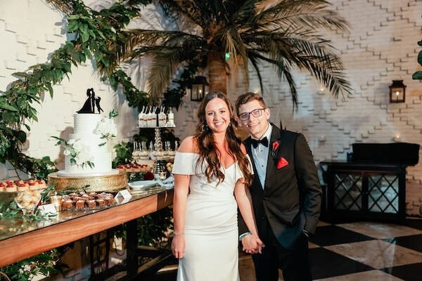 bride and groom just before their cake cutting