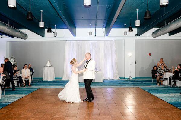 Bride and groom's first dance during their Clearwater Marine Aquarium wedding