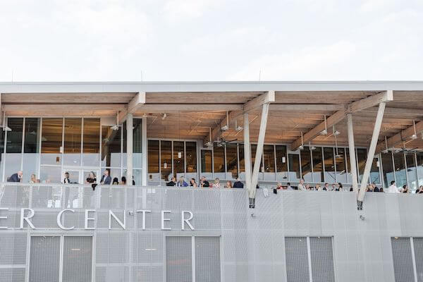 Wedding guests enjoying cocktail hour on the Tampa Riverfront Center's deck