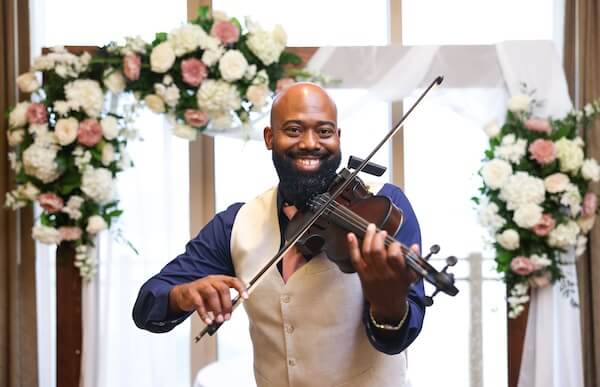 Incredible violinist playing for a Clearwater Beach wedding ceremony