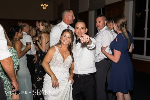 Bride and groom partying at their Le Meridien Tampa wedding