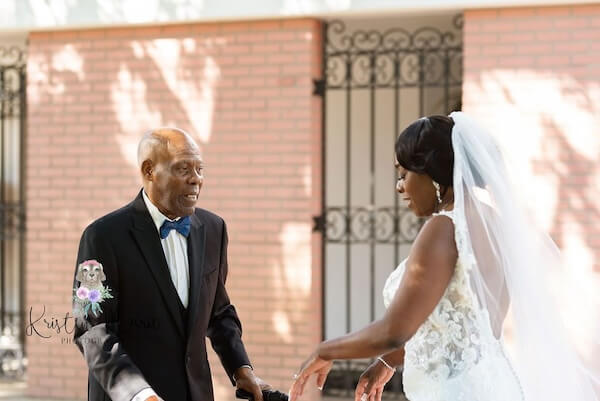 Bride's first look with her dad before her Tampa Garden Club wedding ceremony.