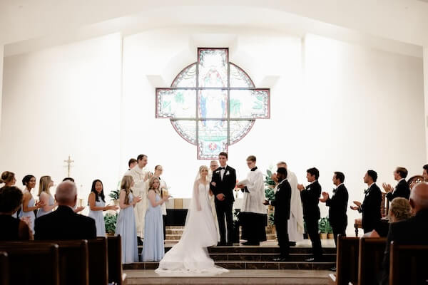 Tampa Bay Bride and Groom at Christ The King Catholic Church after the wedding