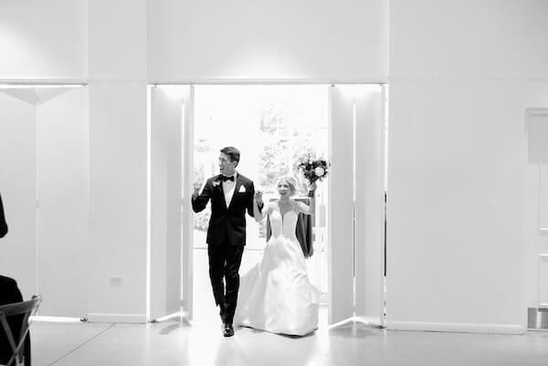 Newlyweds make their grand entrance at their Tampa Bay wedding reception