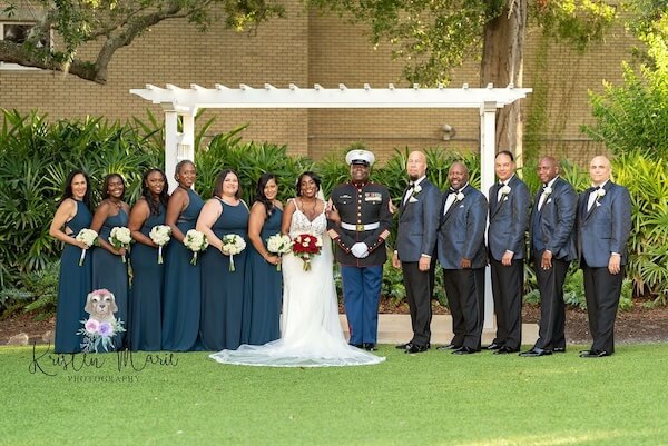 Tampa bride and groom with their wedding party at the Tampa Garden Club.