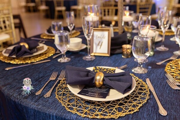 Navy, white and gold wedding reception decor at the Tampa Garden Club