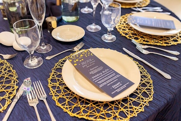 Navy, white and gold wedding reception decor at the Tampa Garden Club