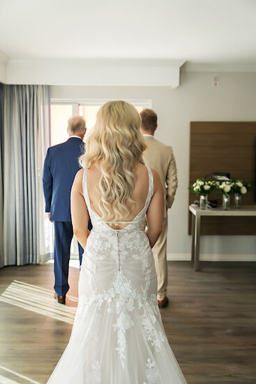 A first loom with the bride, her father, and her brother.