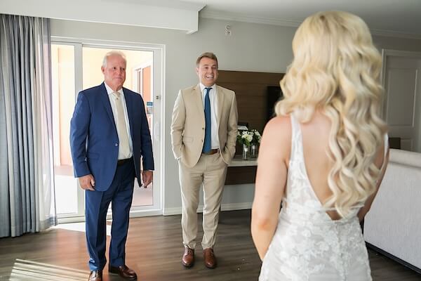 A first loom with the bride, her father, and her brother.